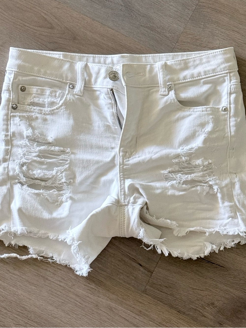 American Eagle High Rise White Distressed Denim Shorts